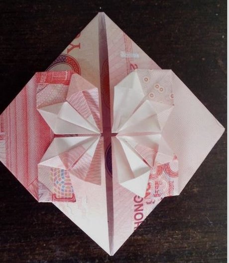 用人民币折纸大全 人民币折爱心的步骤图解 纸币折纸 钱折纸