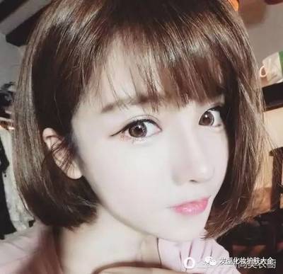 十岁女孩剪短发的照片